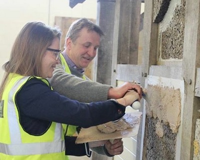 Kirsty Williams attempts some plastering